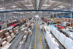 Furniture panel production line showing batch manufacturing for MOQ planning