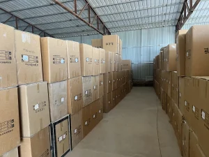 Rows of packed furniture cartons stored in a warehouse